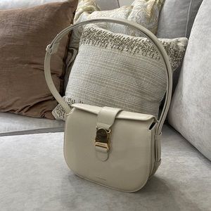 Senreve Cadence crossbody bag in cream, with dust bag and gold shoulder chain